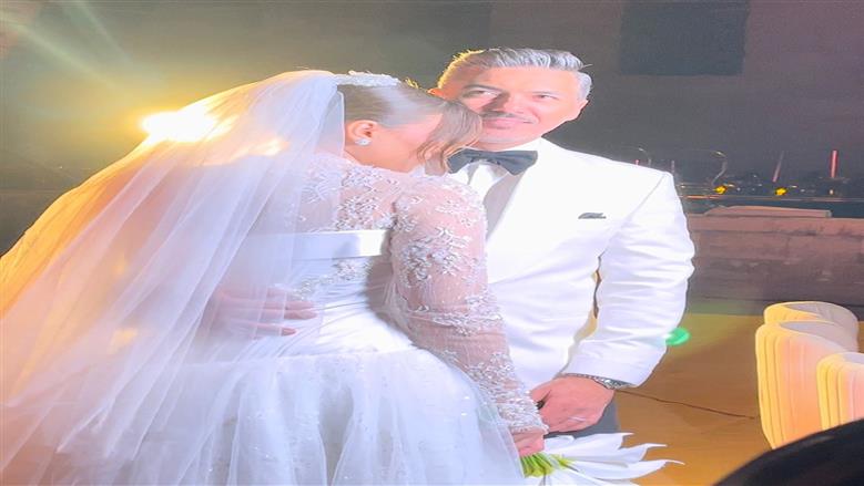 هايدي موسى وزوجها محمد غانم<br>&nbsp;