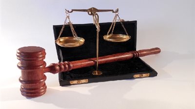 الجنايات تقضي بالمشدد للمتهمين بإنهاء حياة صديقهم بمحل حلاقة في الطالبية